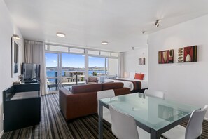 Luxury Studio, 1 King Bed, Lake View | Desk, laptop workspace, iron/ironing board, free WiFi