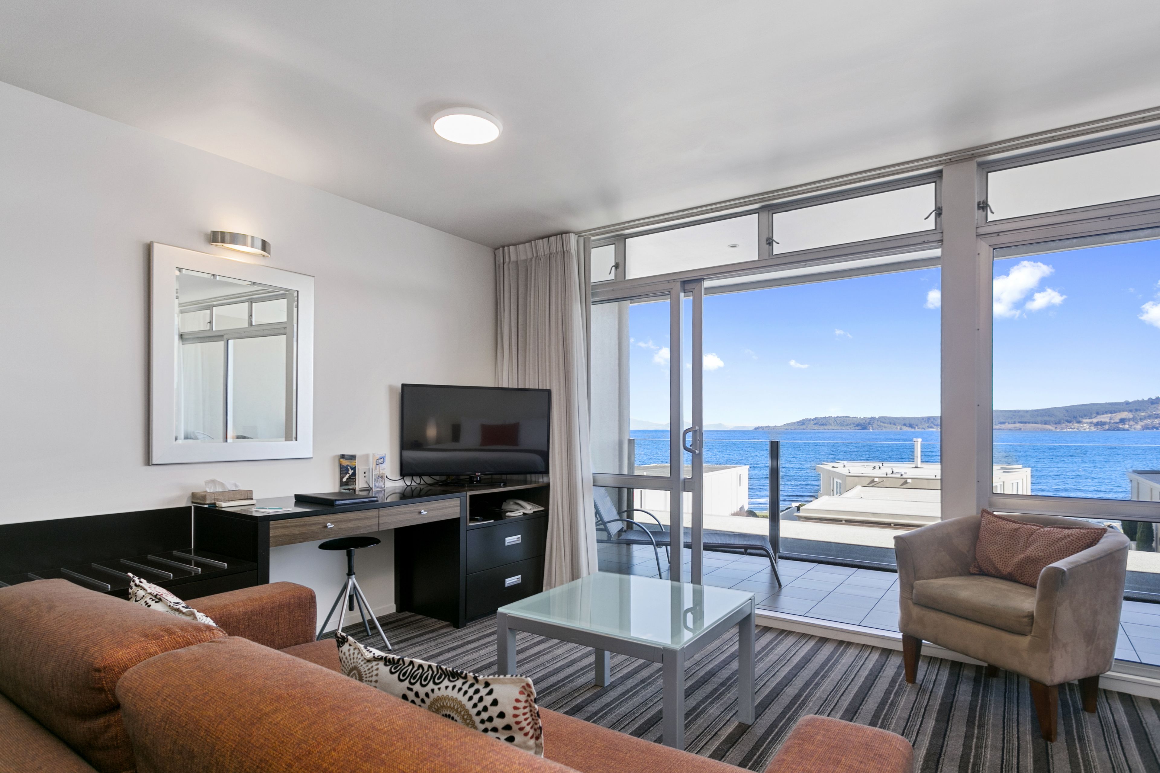 Luxury Studio, 1 King Bed, Lake View | Desk, laptop workspace, iron/ironing board, free WiFi