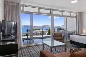 Luxury Studio, 1 King Bed, Lake View | Desk, laptop workspace, iron/ironing board, free WiFi