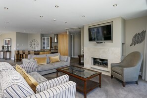 Luxury Apartment, 3 Bedrooms, Lake View, Lakeside | Living area | Flat-screen TV - The Reef Resort (Taupo)