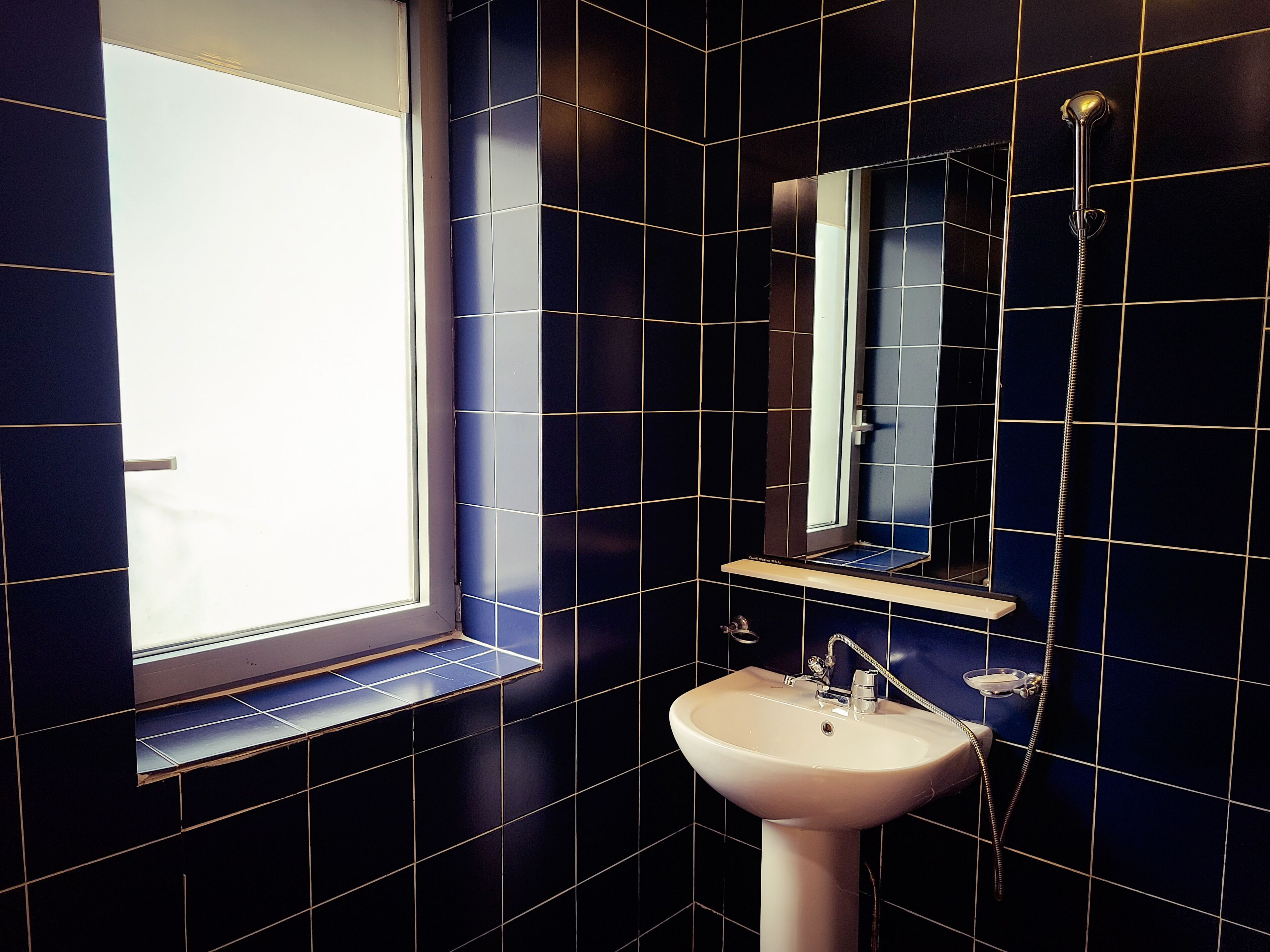 suite quadruple room | bathroom | shower, free toiletries, hair dryer, towels