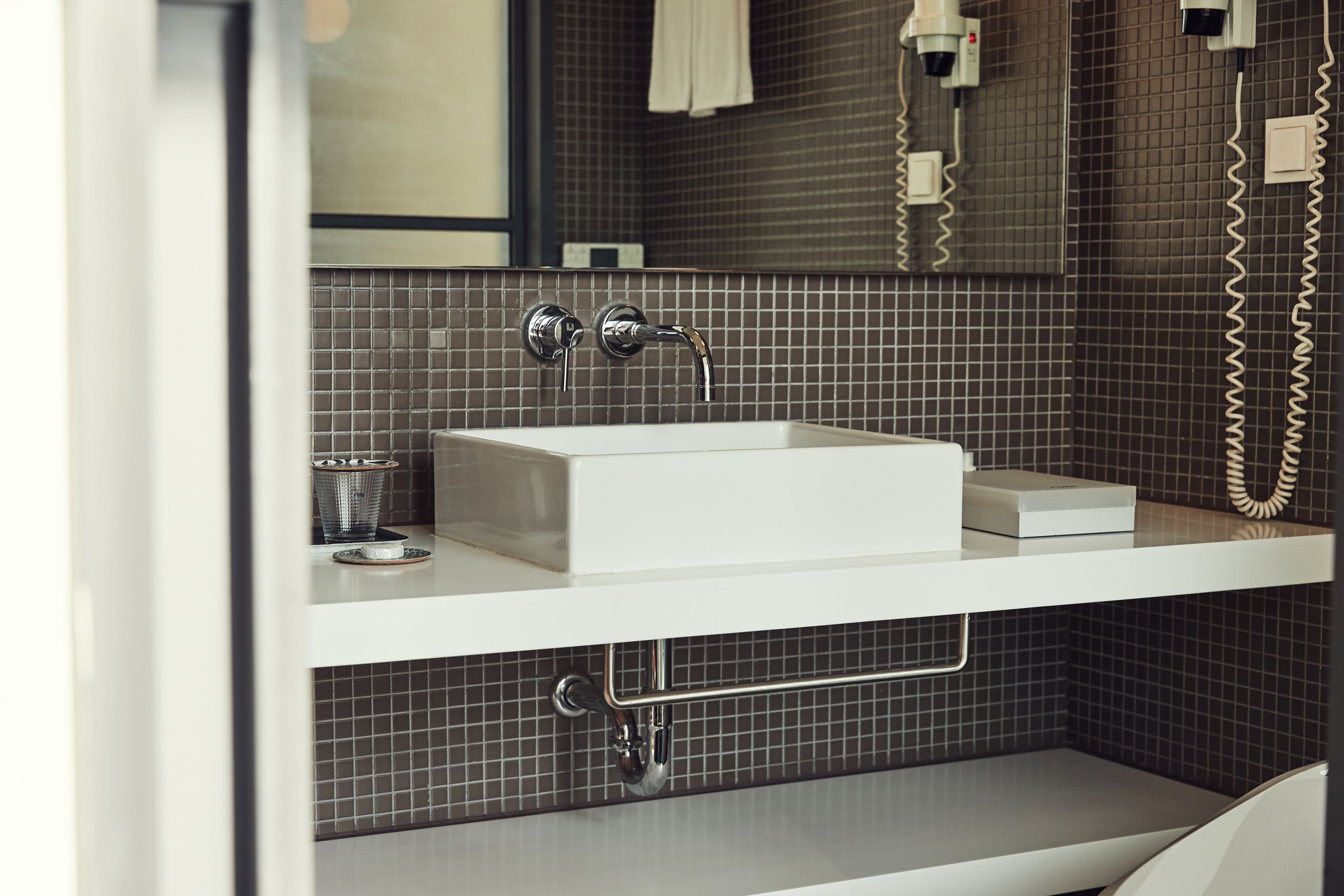 west double lacasa (assign random rooms with different room structures, same room size) | bathroom | free toiletries, hair dryer, slippers, towels