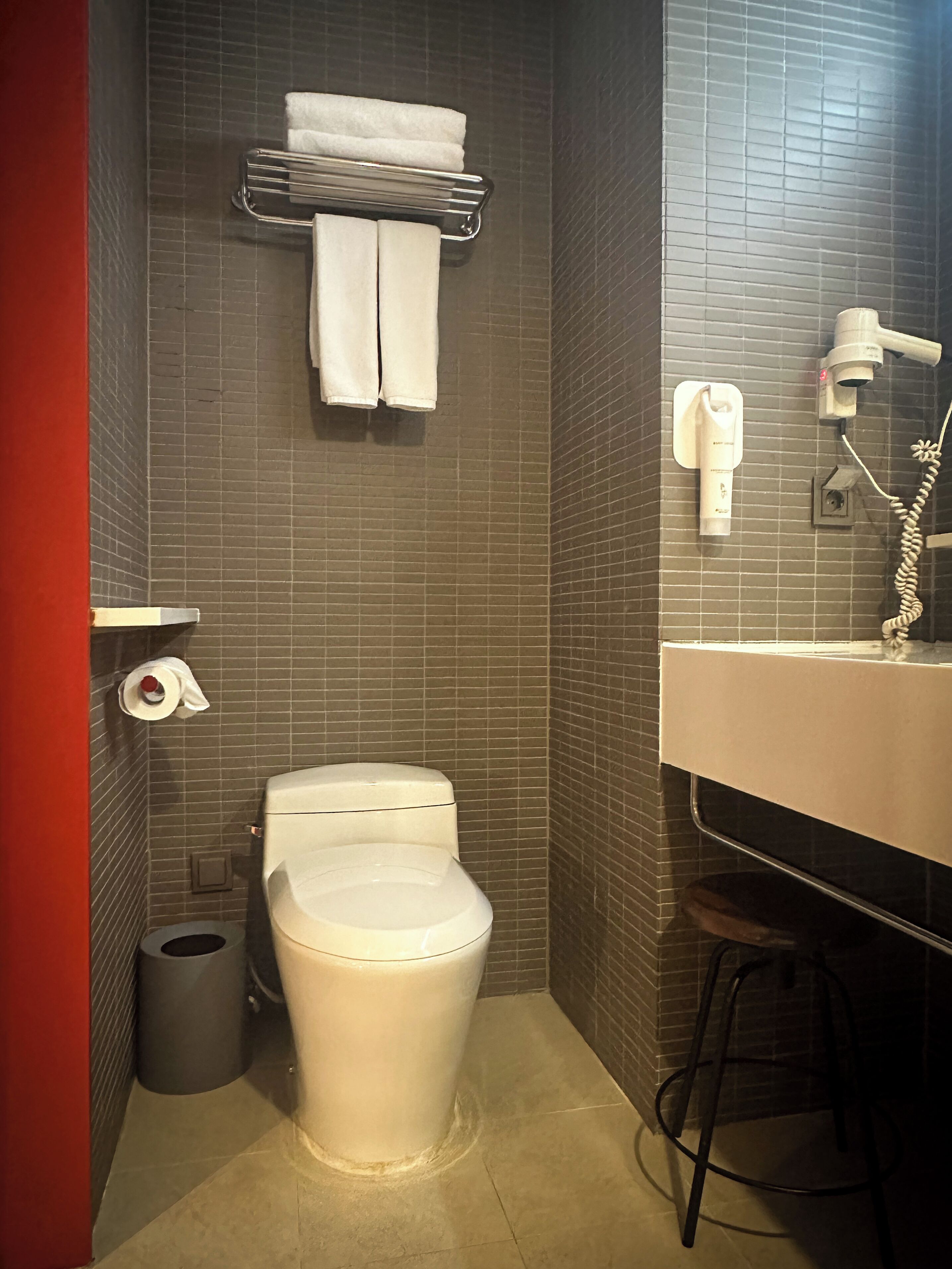 east twin bath | bathroom | free toiletries, hair dryer, slippers, towels