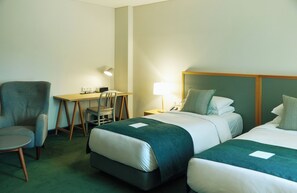 West Twin Bath | Premium bedding, in-room safe, desk, free WiFi