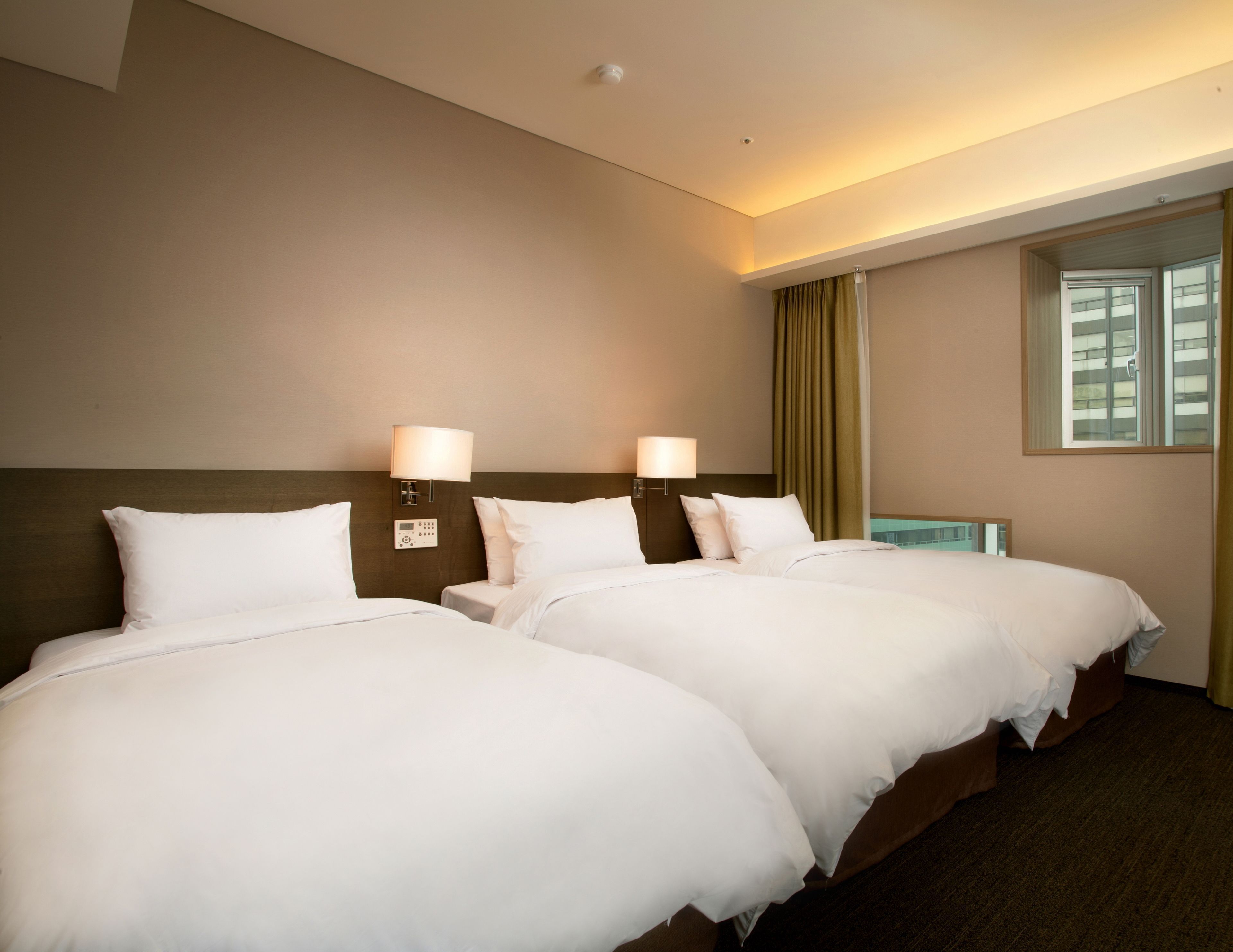 Premium bedding, down duvets, in-room safe, desk