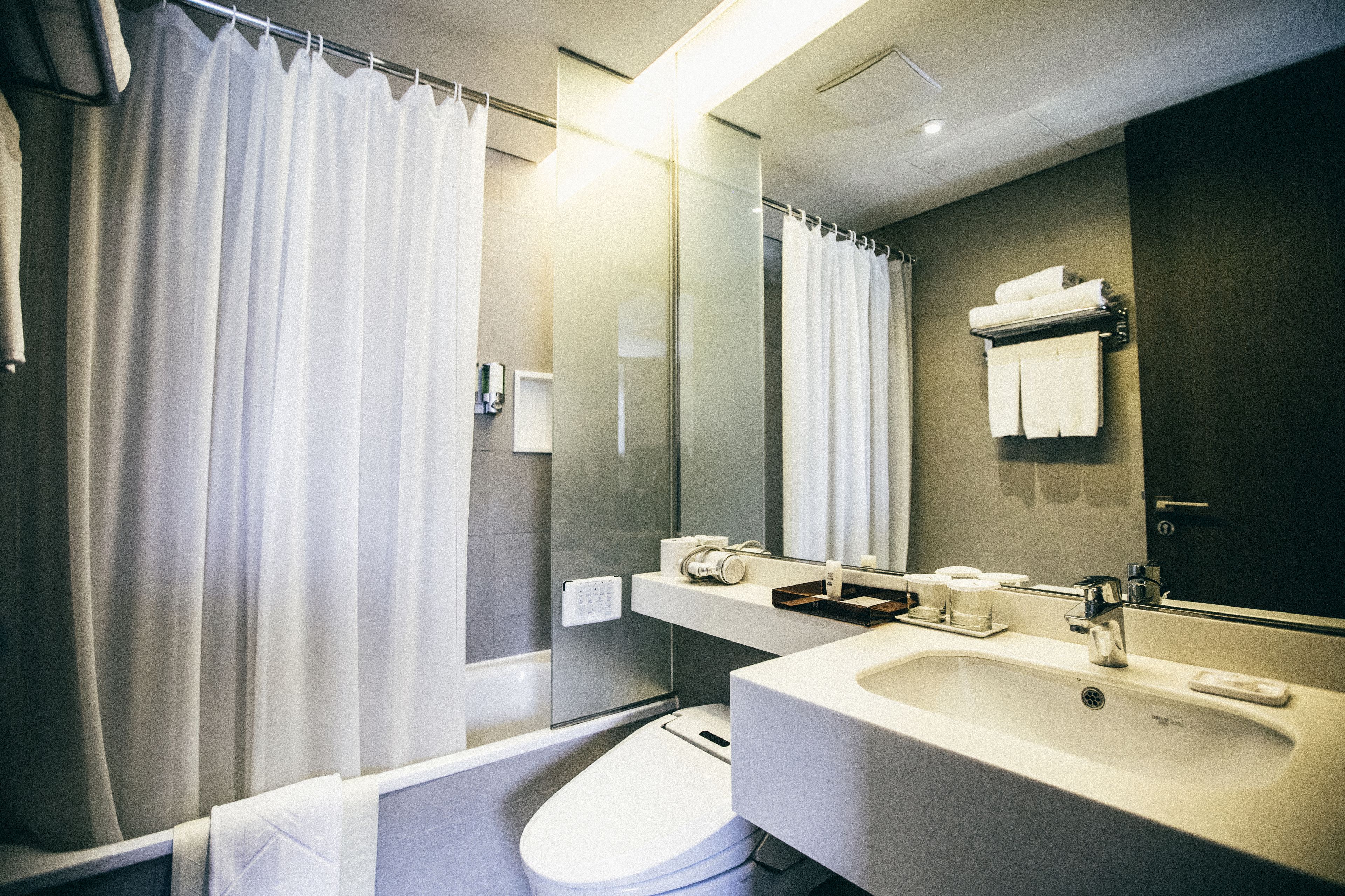 family twin room | bathroom | shower, hair dryer, bathrobes, slippers