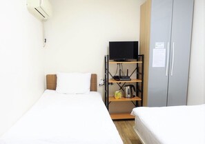 Cortinas blackout, wifi gratis y ropa de cama