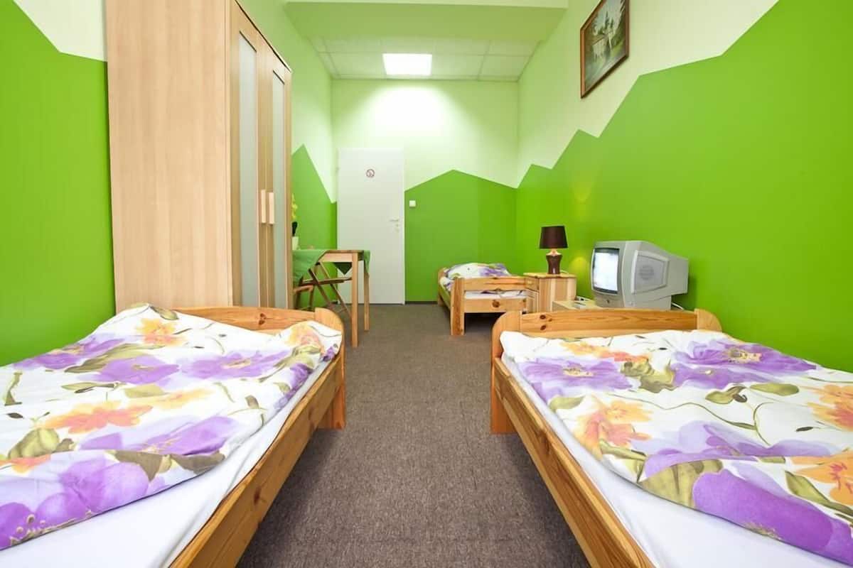 Triple Room, Shared Bathroom | Free cribs/infant beds, free WiFi, bed sheets