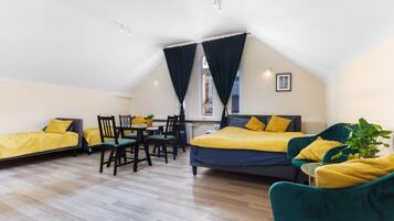 Deluxe Quadruple Room | In-room safe, free WiFi, bed sheets