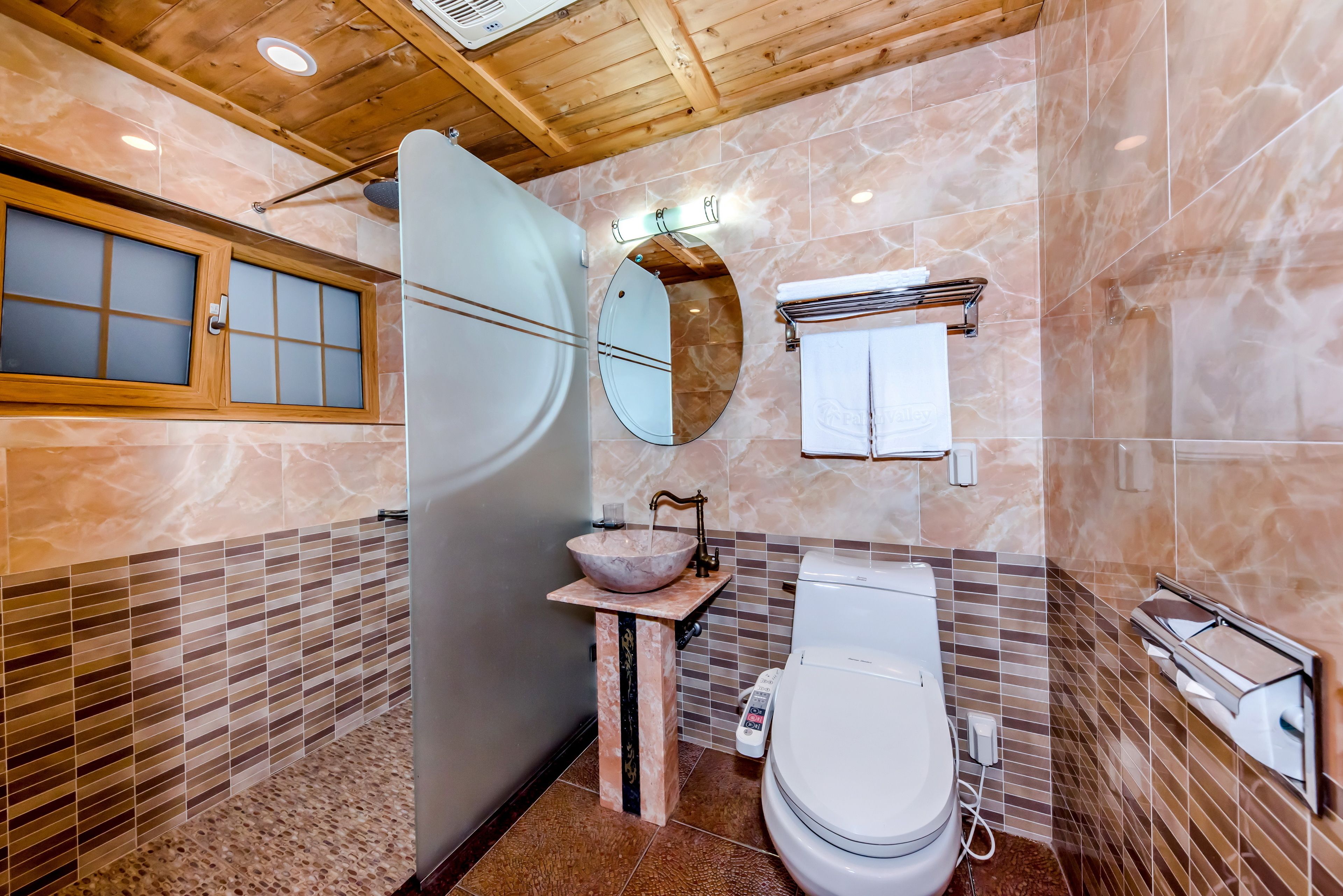 camelville pool villa suite | bathroom | separate bathtub and shower, deep-soaking bathtub, rainfall showerhead