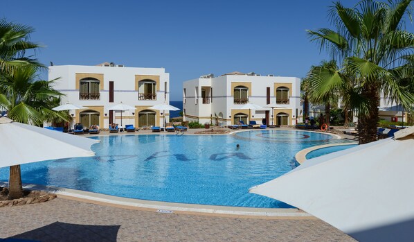 Outdoor pool, pool umbrellas, pool loungers