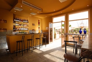 3 bars/lounges, poolside bar, beach bar