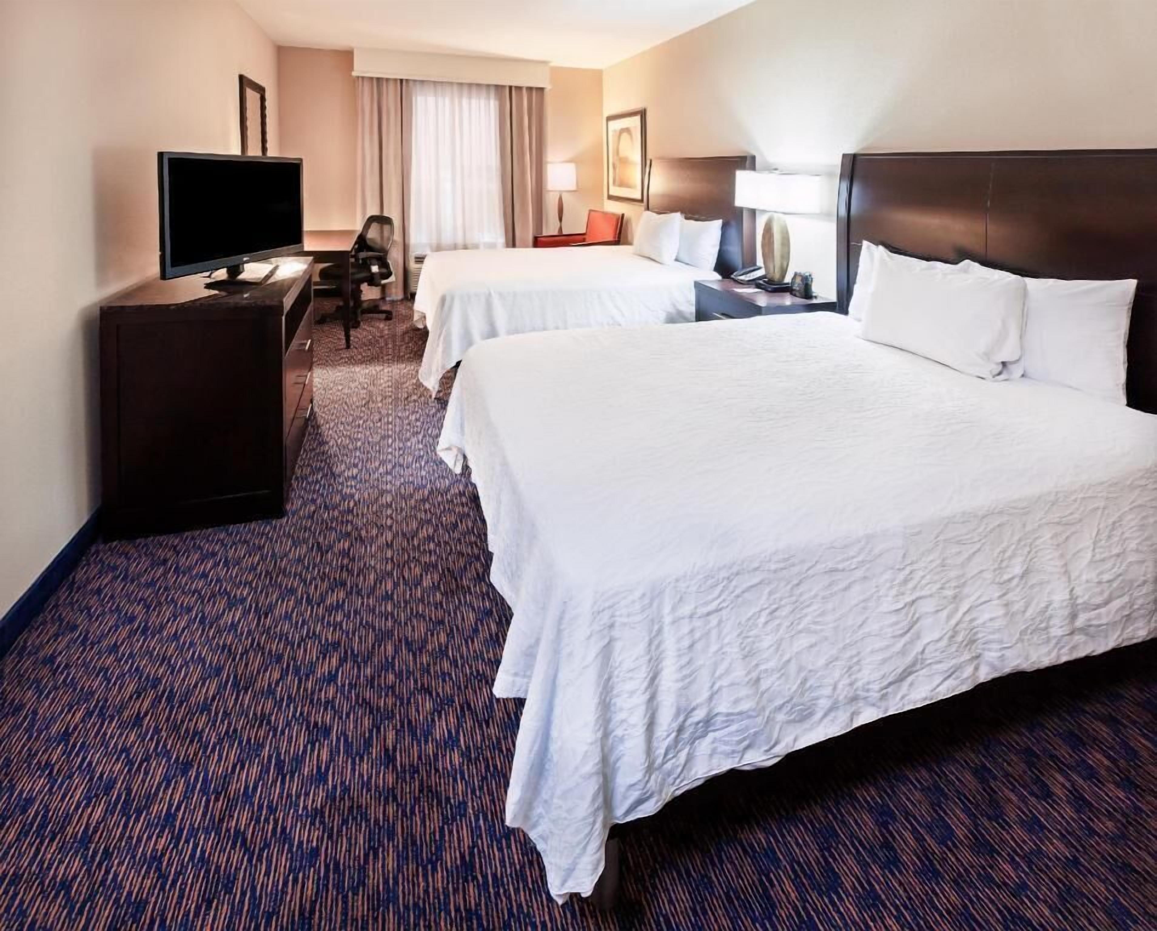 Hypo-allergenic bedding, desk, laptop workspace, free cots/infant beds