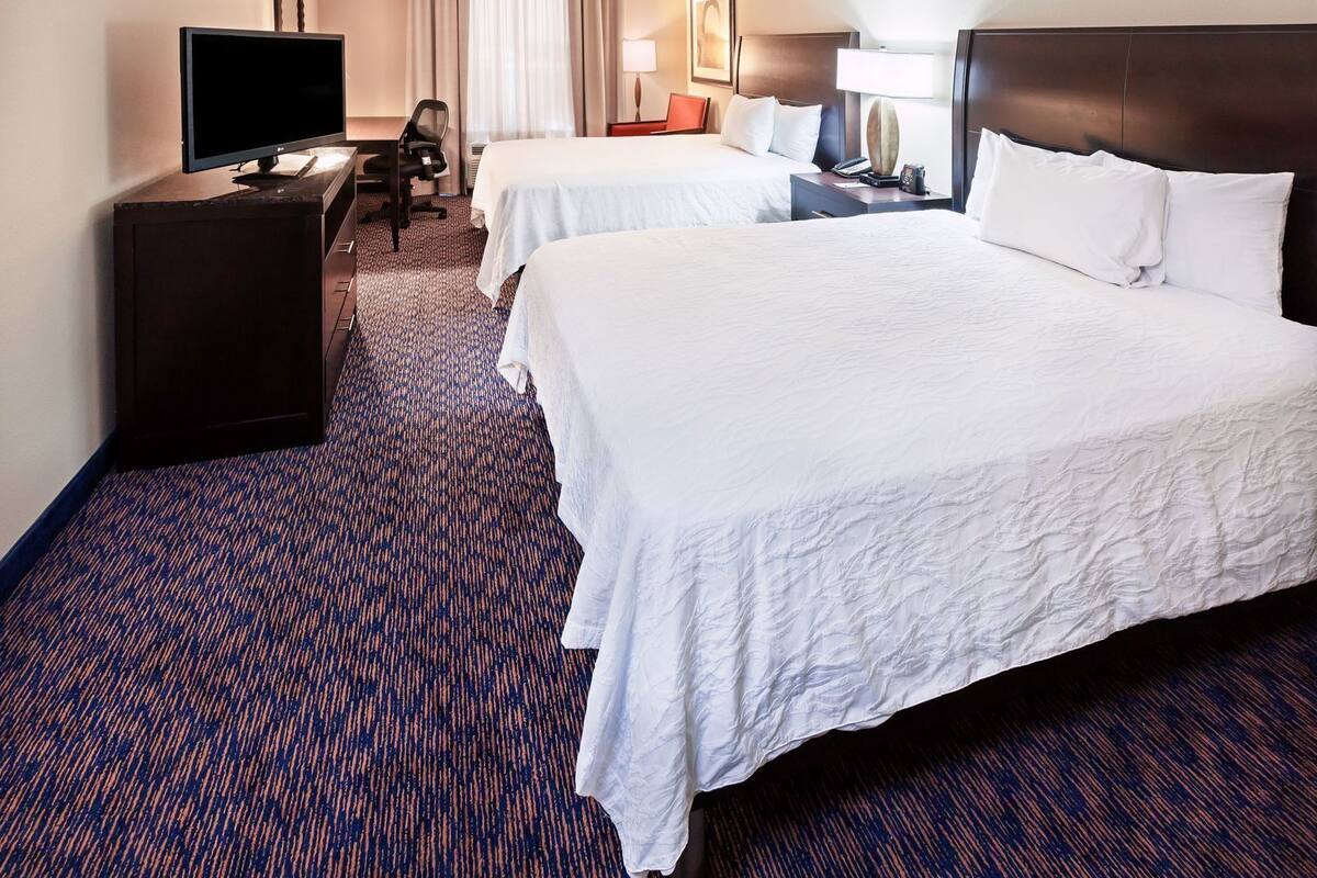 Hypo-allergenic bedding, desk, laptop workspace, free cots/infant beds