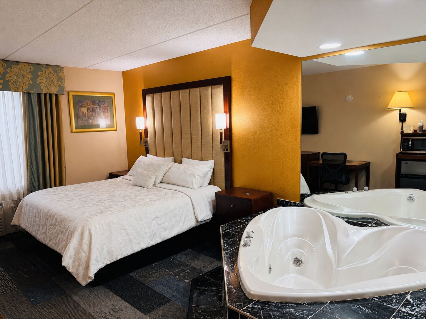 Suite (Jacuzzi) | Desk, blackout curtains, iron/ironing board, free cots/infant beds