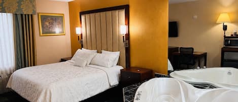 Suite (Jacuzzi) | Desk, blackout drapes, iron/ironing board, free cribs/infant beds