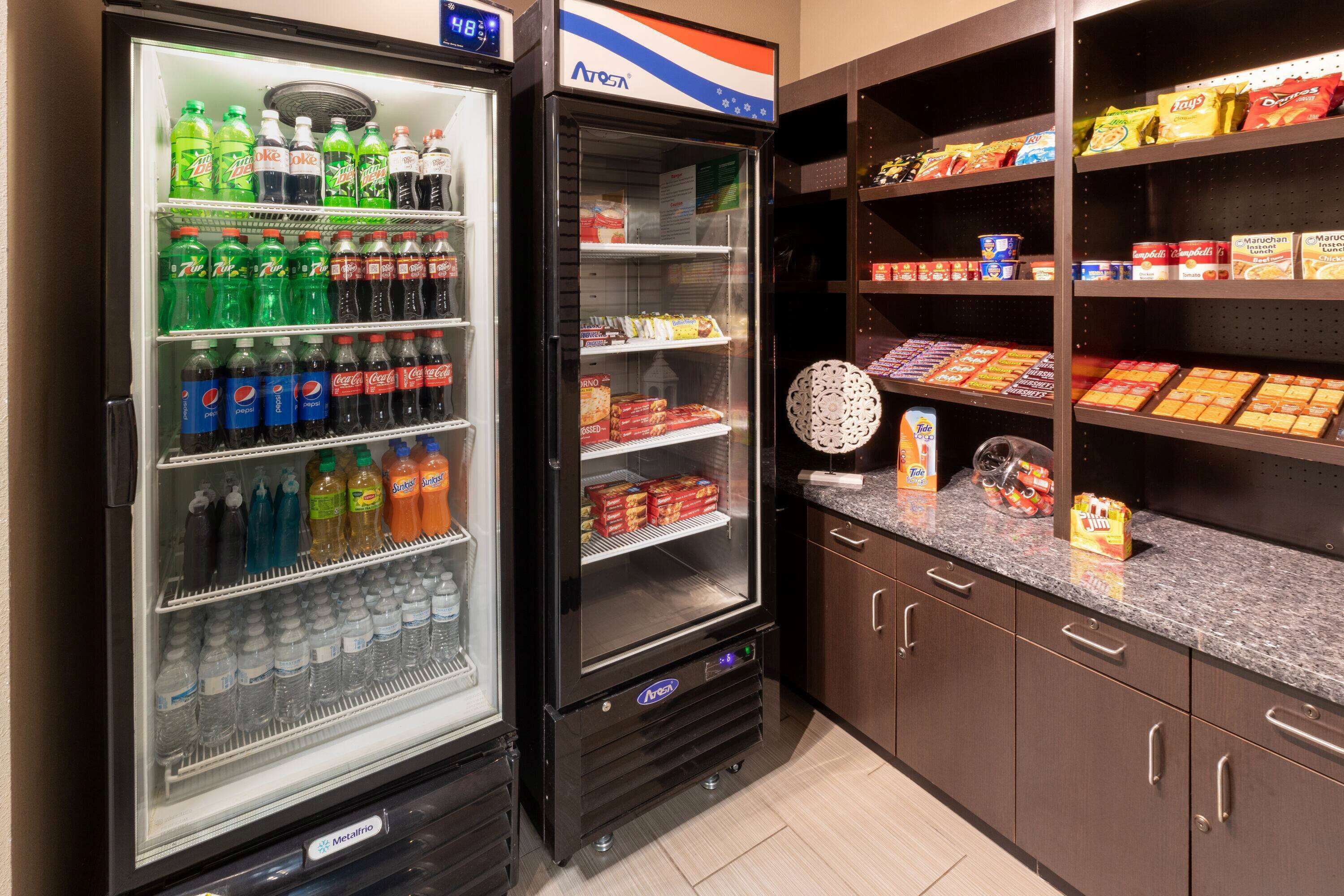 A vending machine with various beverages and snacks.