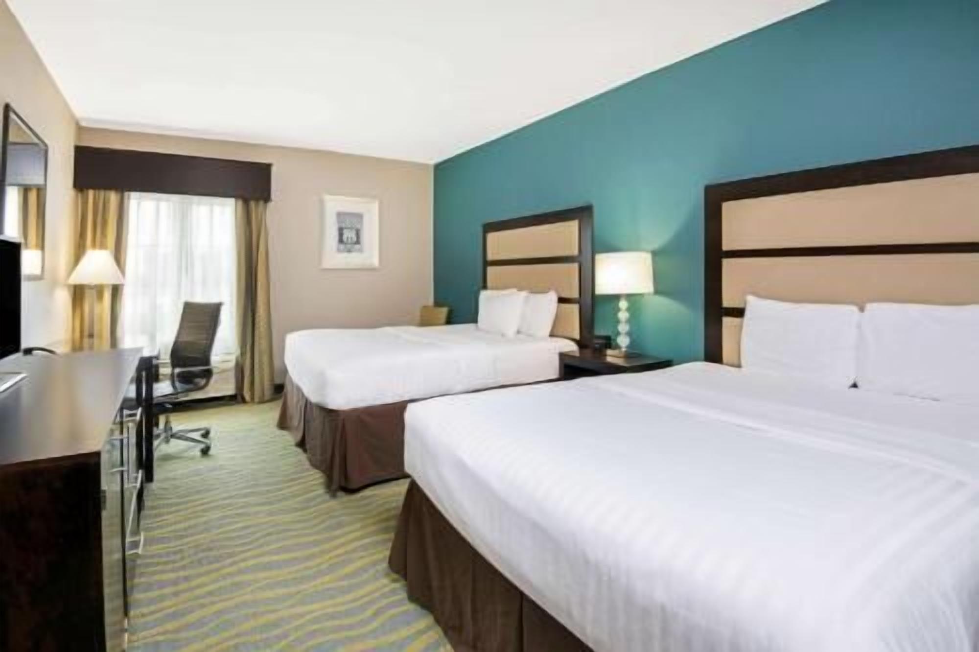 Premium bedding, down comforters, pillowtop beds, desk