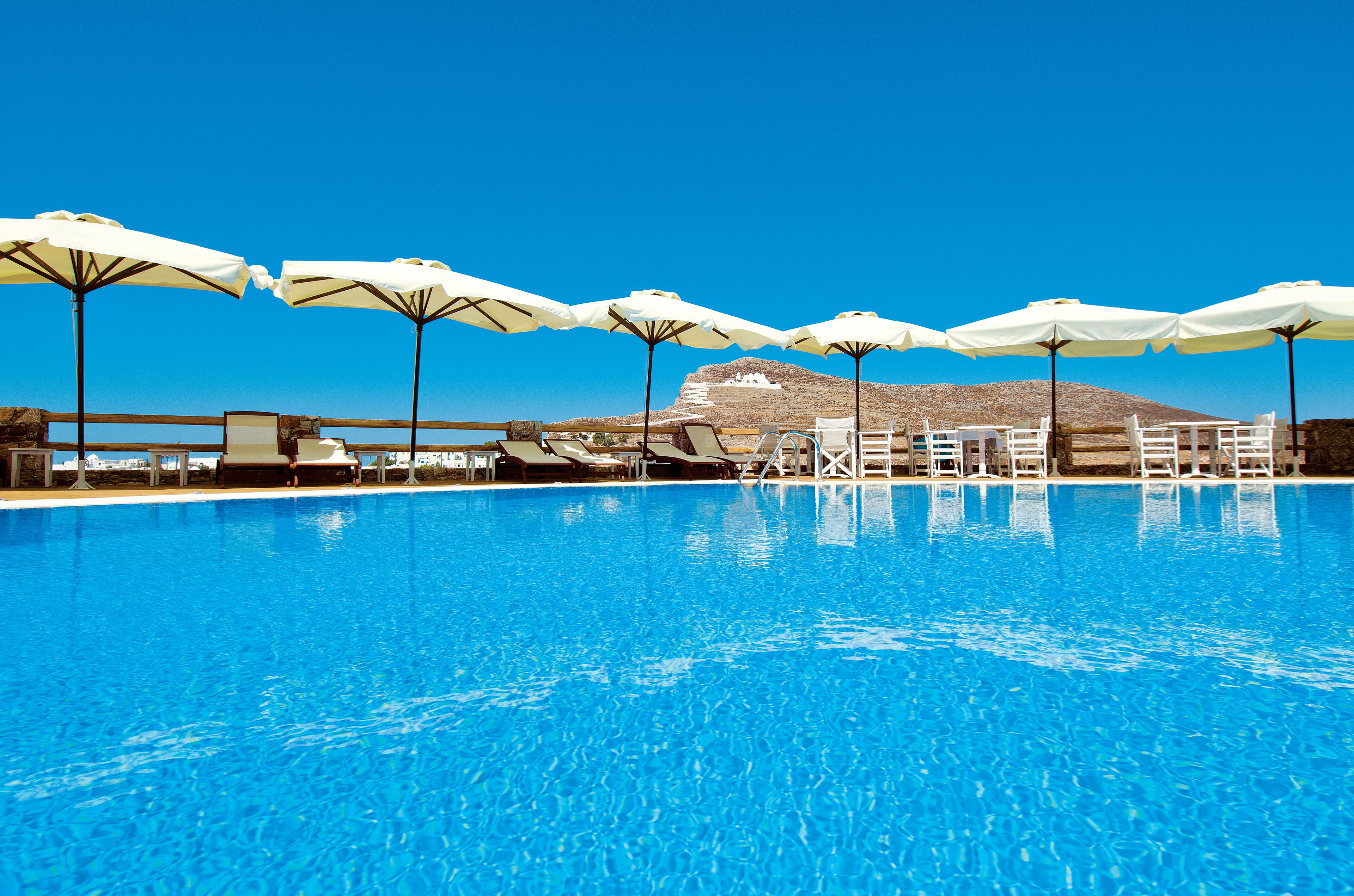 seasonal outdoor pool, pool umbrellas, pool loungers