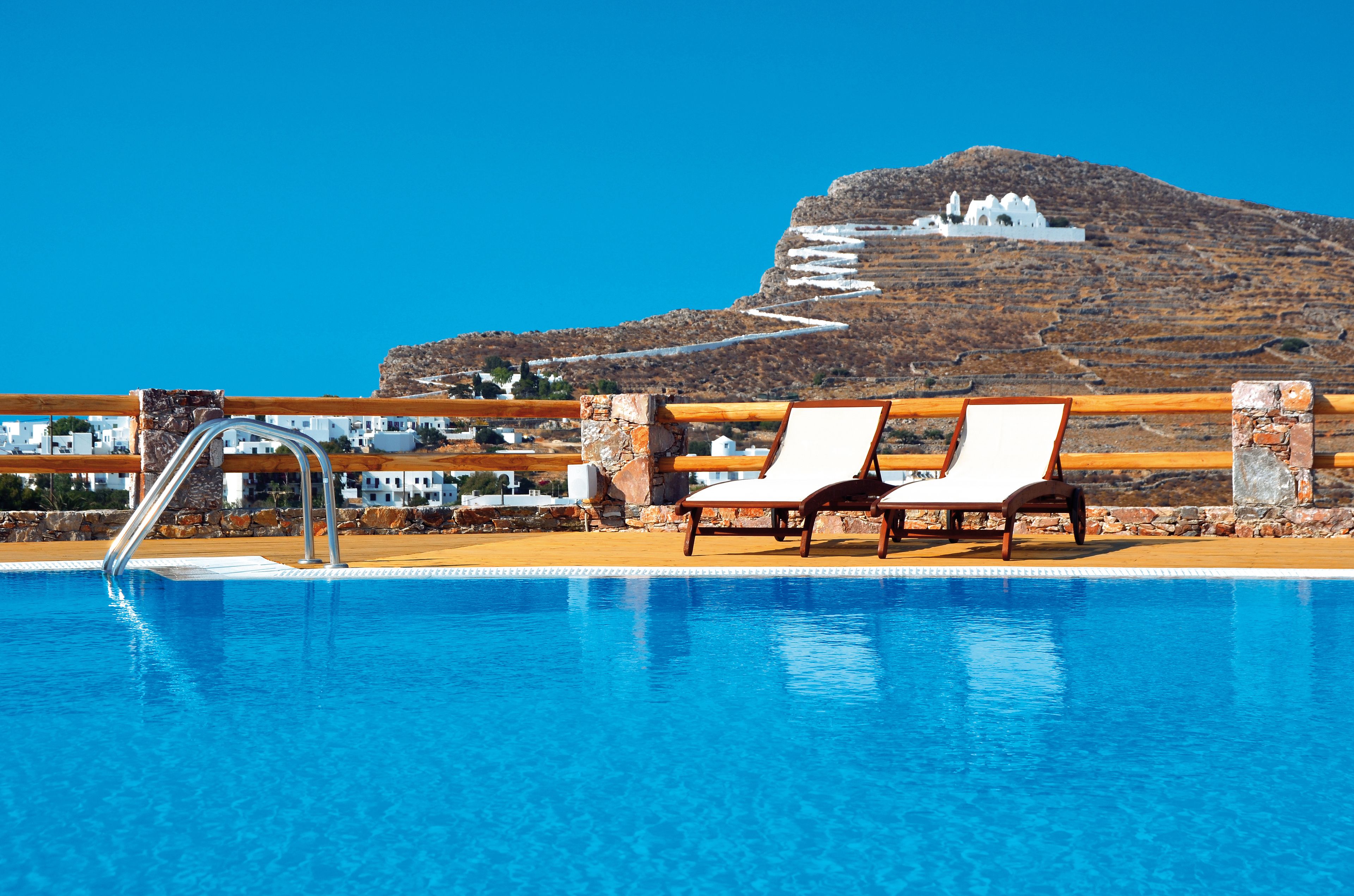 seasonal outdoor pool, pool umbrellas, pool loungers