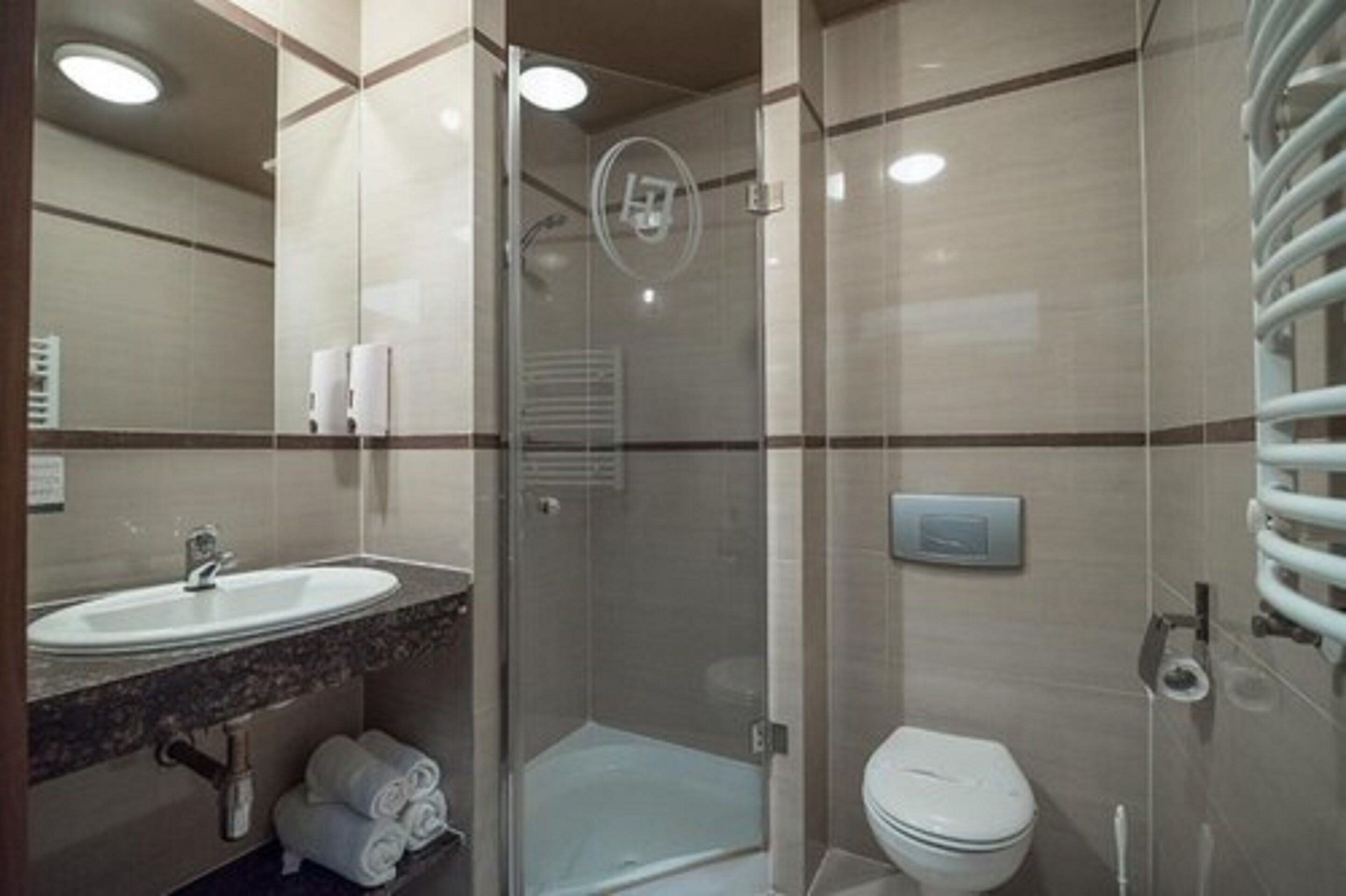 standard double or twin room | bathroom | hair dryer, towels, soap, toilet paper