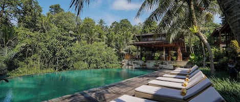 2 outdoor pools, sun loungers