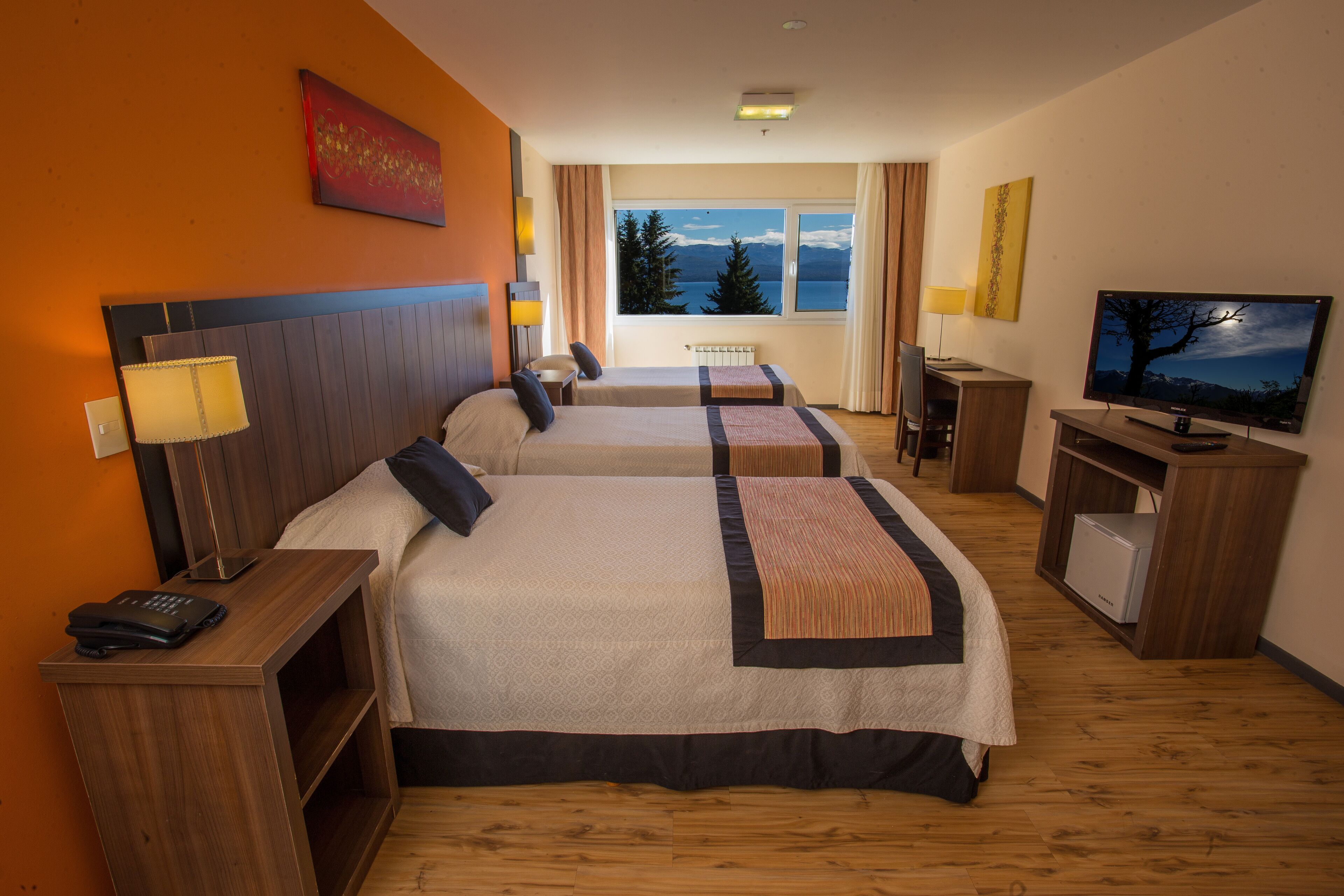 superior triple room, lake view | in-room safe, desk, blackout curtains, free wifi