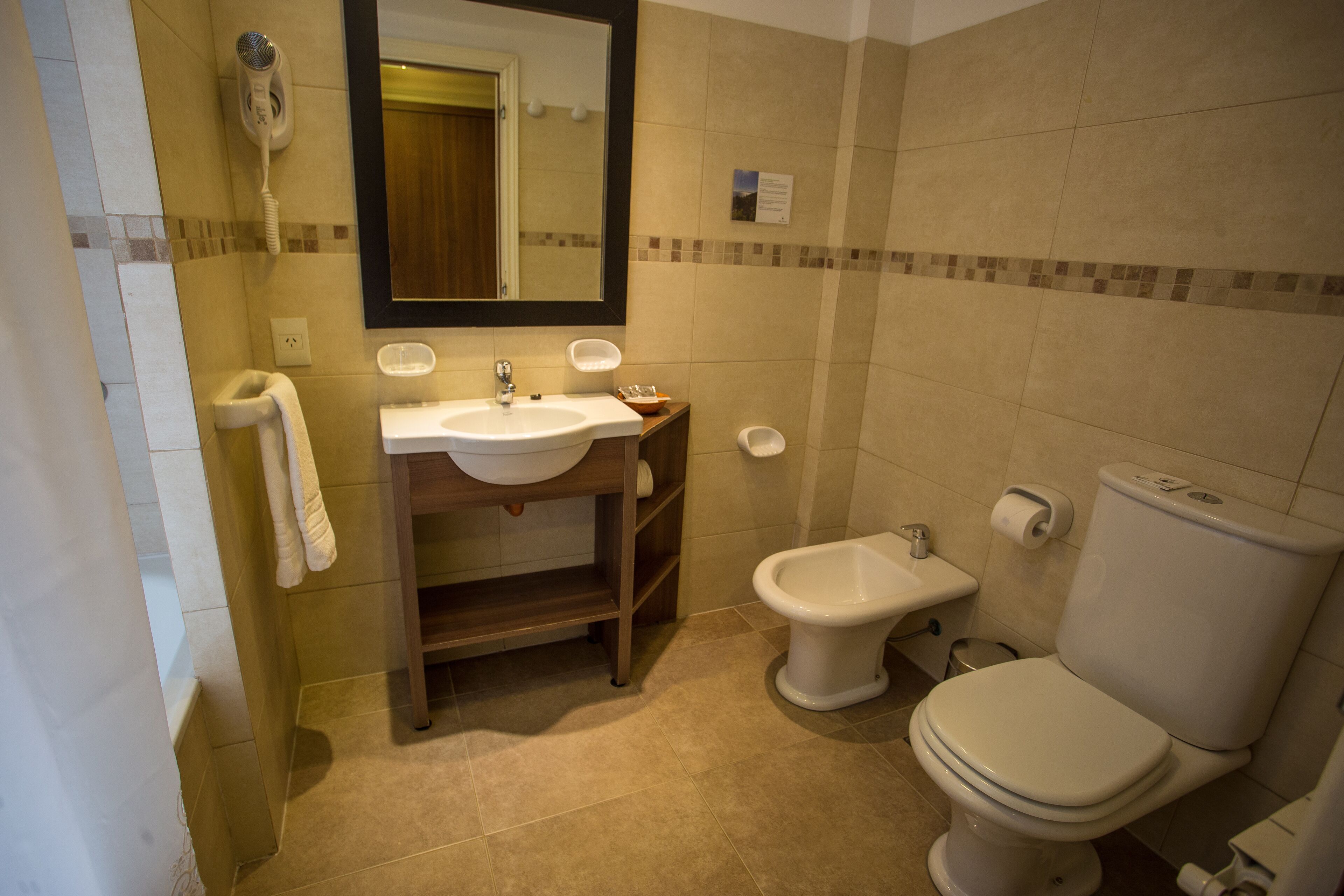 rainfall showerhead, hair dryer, bidet, towels