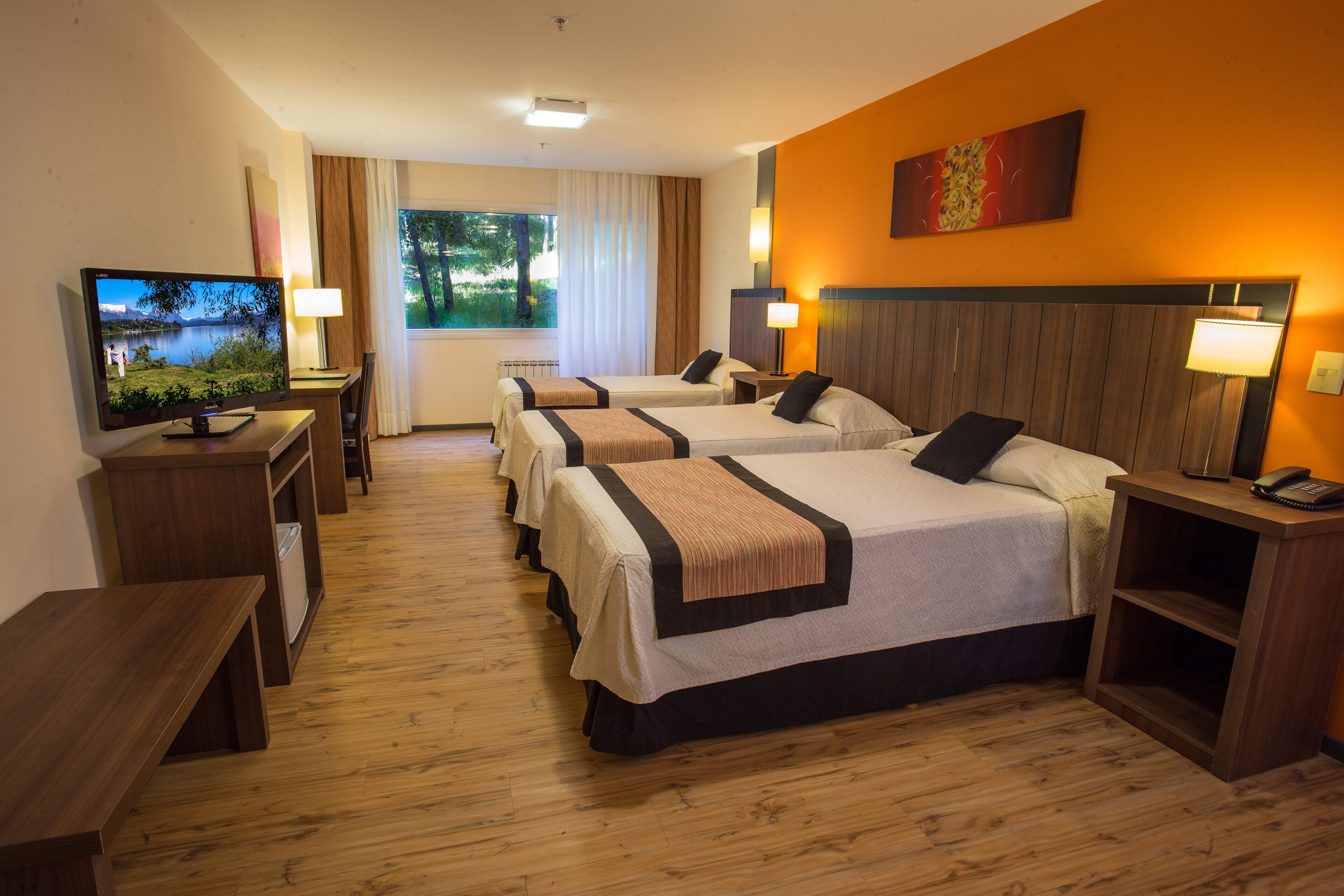 superior triple room, garden view | in-room safe, desk, blackout curtains, free wifi