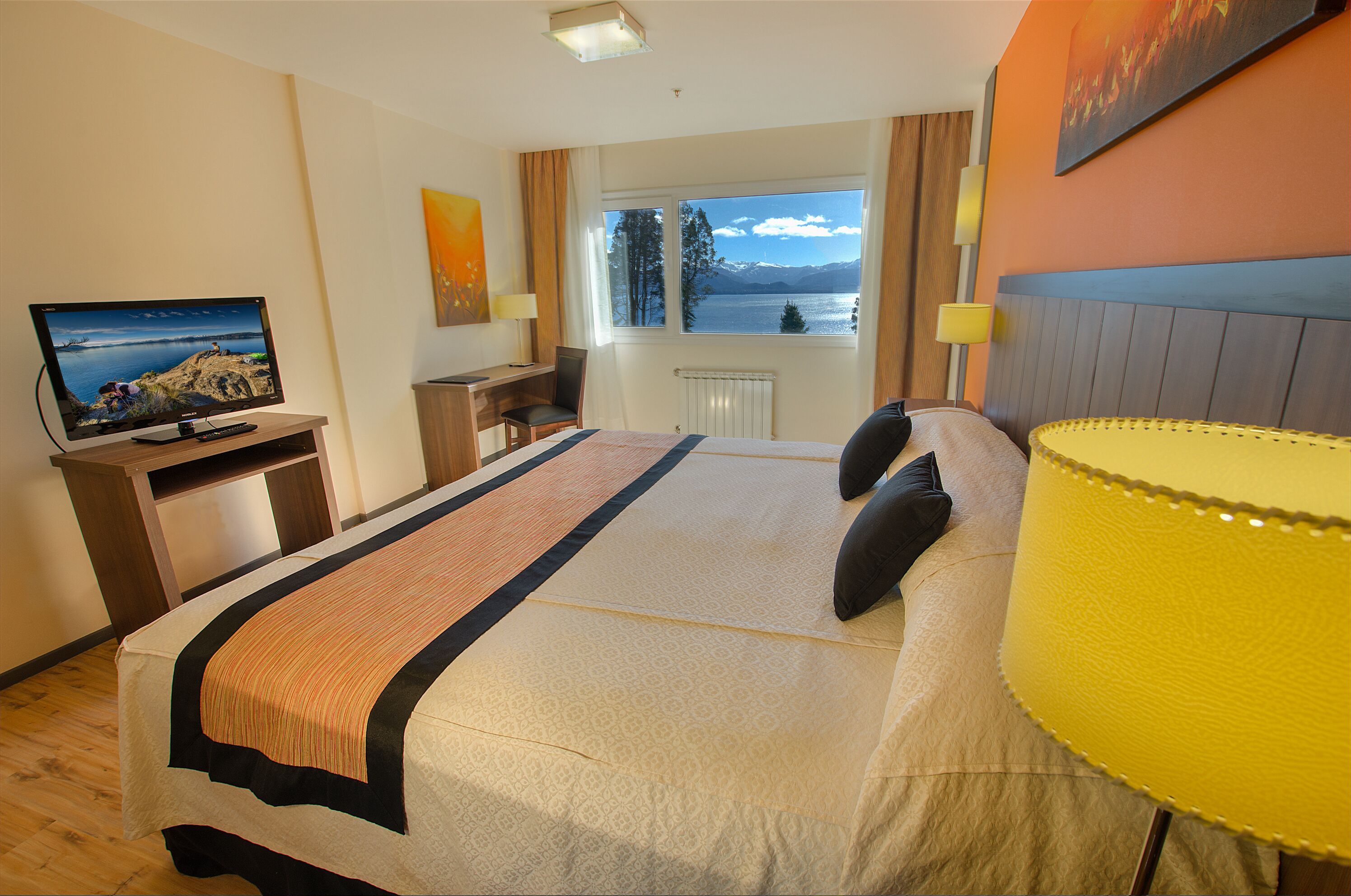 superior room, lake view | in-room safe, desk, blackout curtains, free wifi