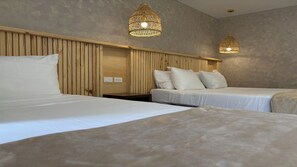 Family Quadruple Room | Bed sheets