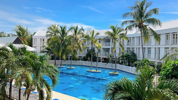 Outdoor pool, open 10:00 AM to 7:00 PM, pool umbrellas, sun loungers