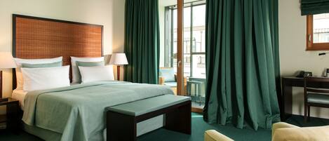 Premium bedding, down comforters, in-room safe, desk