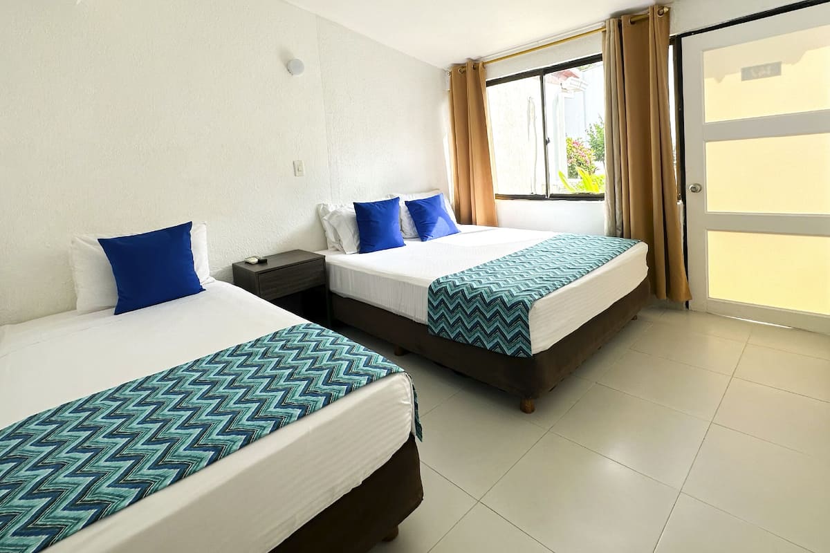 standard triple room | bed sheets