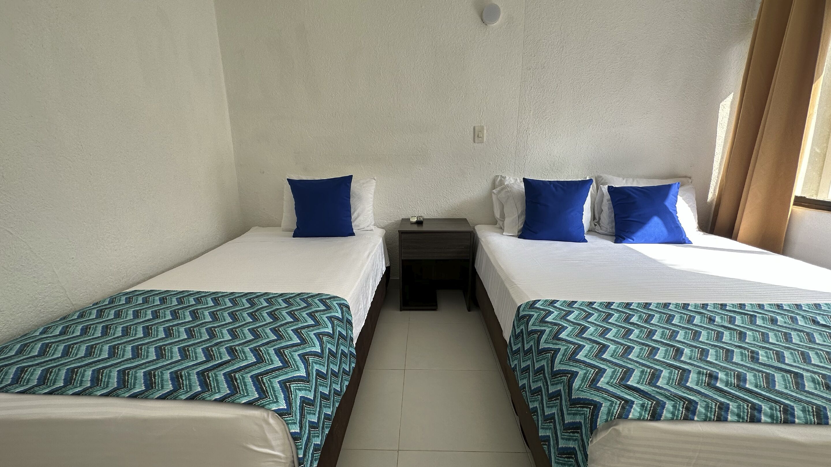 standard triple room | bed sheets