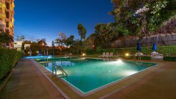 2 outdoor pools, open 8:00 AM to 9:00 PM, pool umbrellas, pool loungers