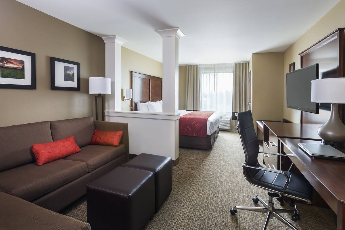 premium bedding, desk, laptop workspace, iron/ironing board