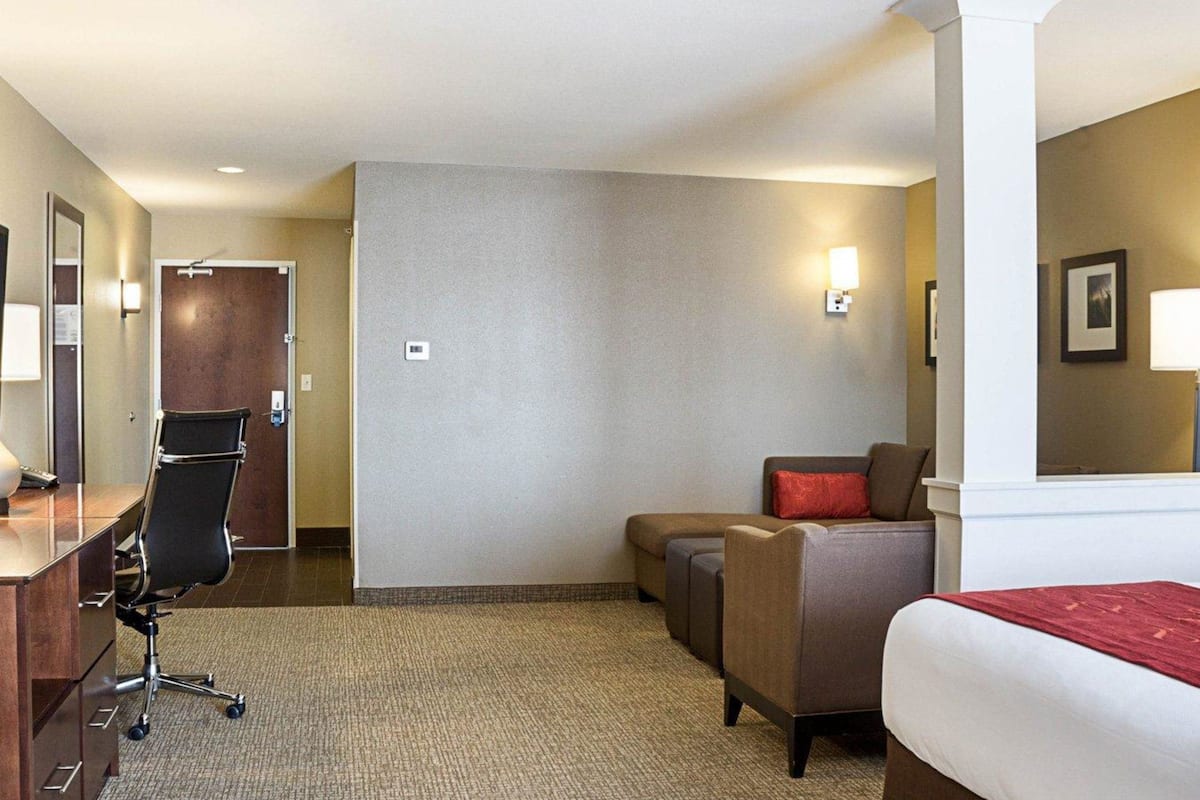 premium bedding, desk, laptop workspace, iron/ironing board