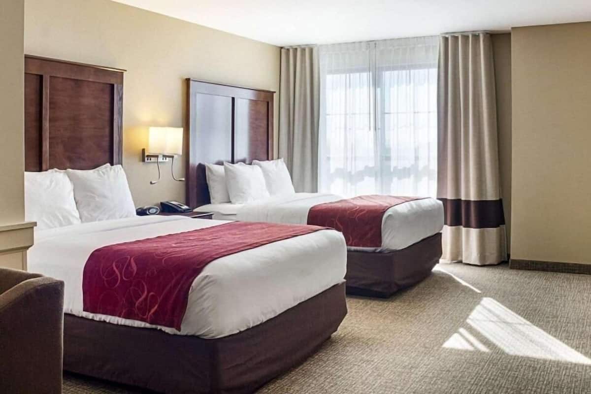Suite, Multiple Beds, Non Smoking, City View | Premium bedding, desk, laptop workspace, iron/ironing board