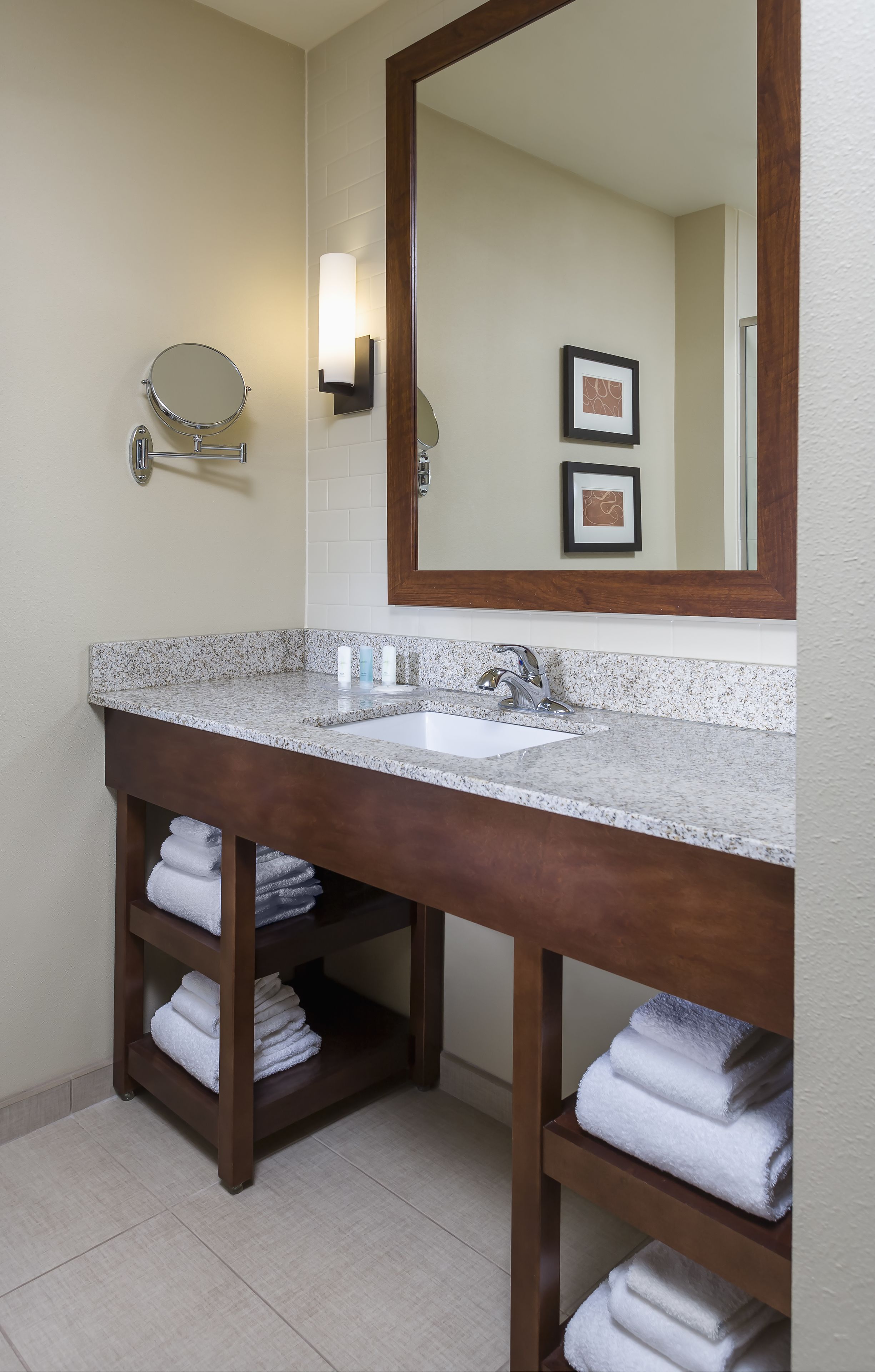 designer toiletries, hair dryer, towels, soap