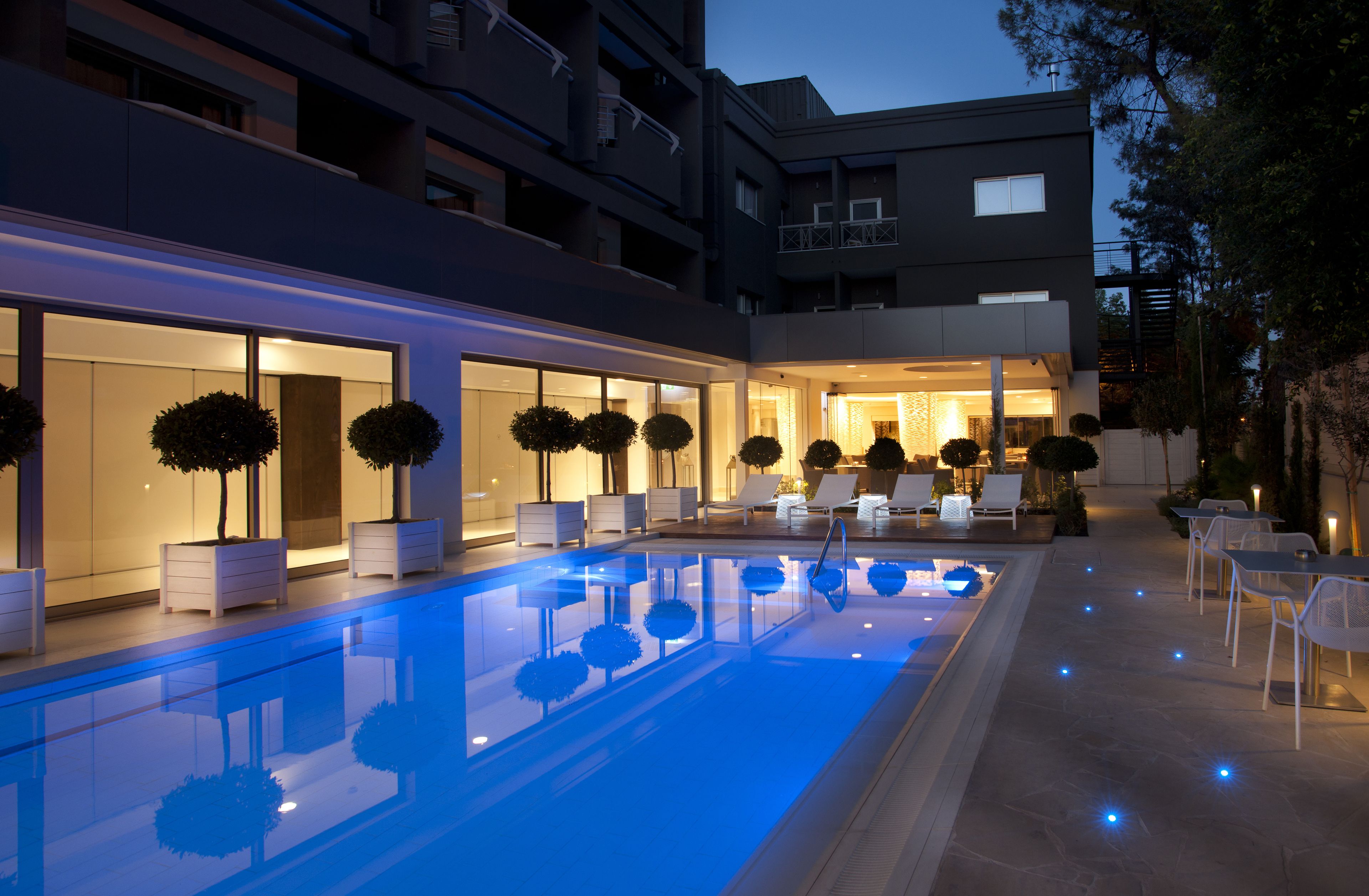 Indoor pool, outdoor pool, pool umbrellas, pool loungers