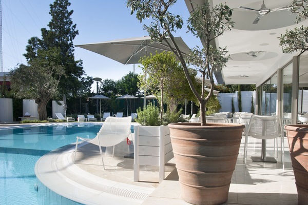Indoor pool, outdoor pool, pool umbrellas, pool loungers