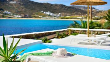 Suite Royal, piscina privata, vista oceano | Una cassaforte in camera, insonorizzazione, ferro/asse da stiro