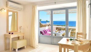 Premium Suite, Sea View | Living area | Flat-screen TV