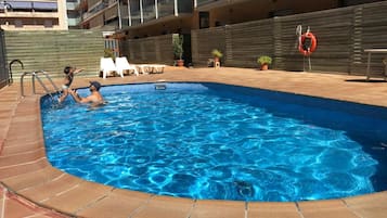 Seasonal outdoor pool, pool umbrellas, sun loungers