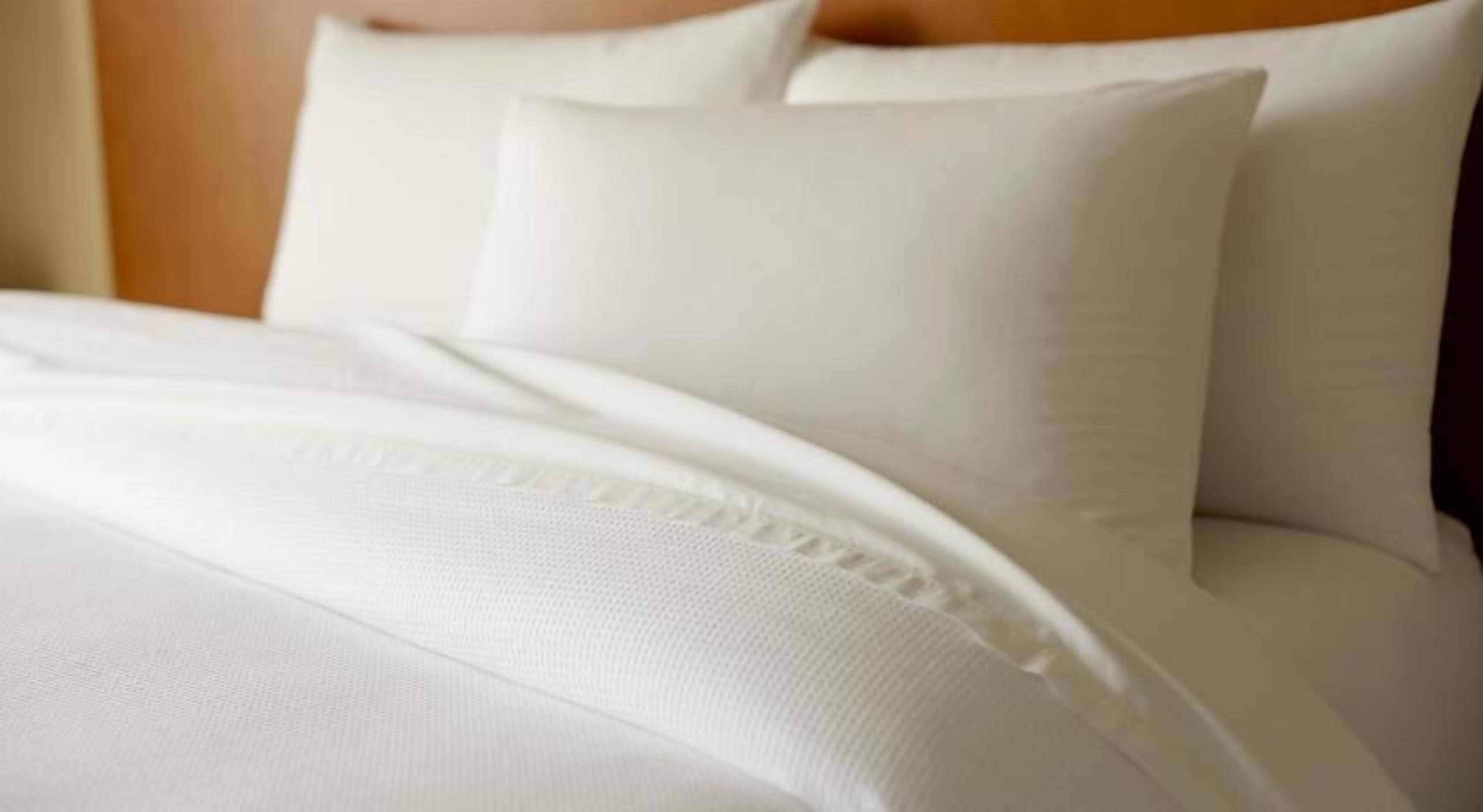 Hypo-allergenic bedding, desk, iron/ironing board, free cots/infant beds