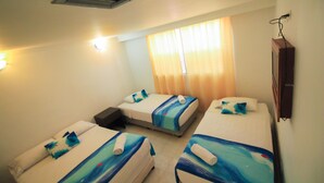 Coffres-forts dans les chambres, draps fournis