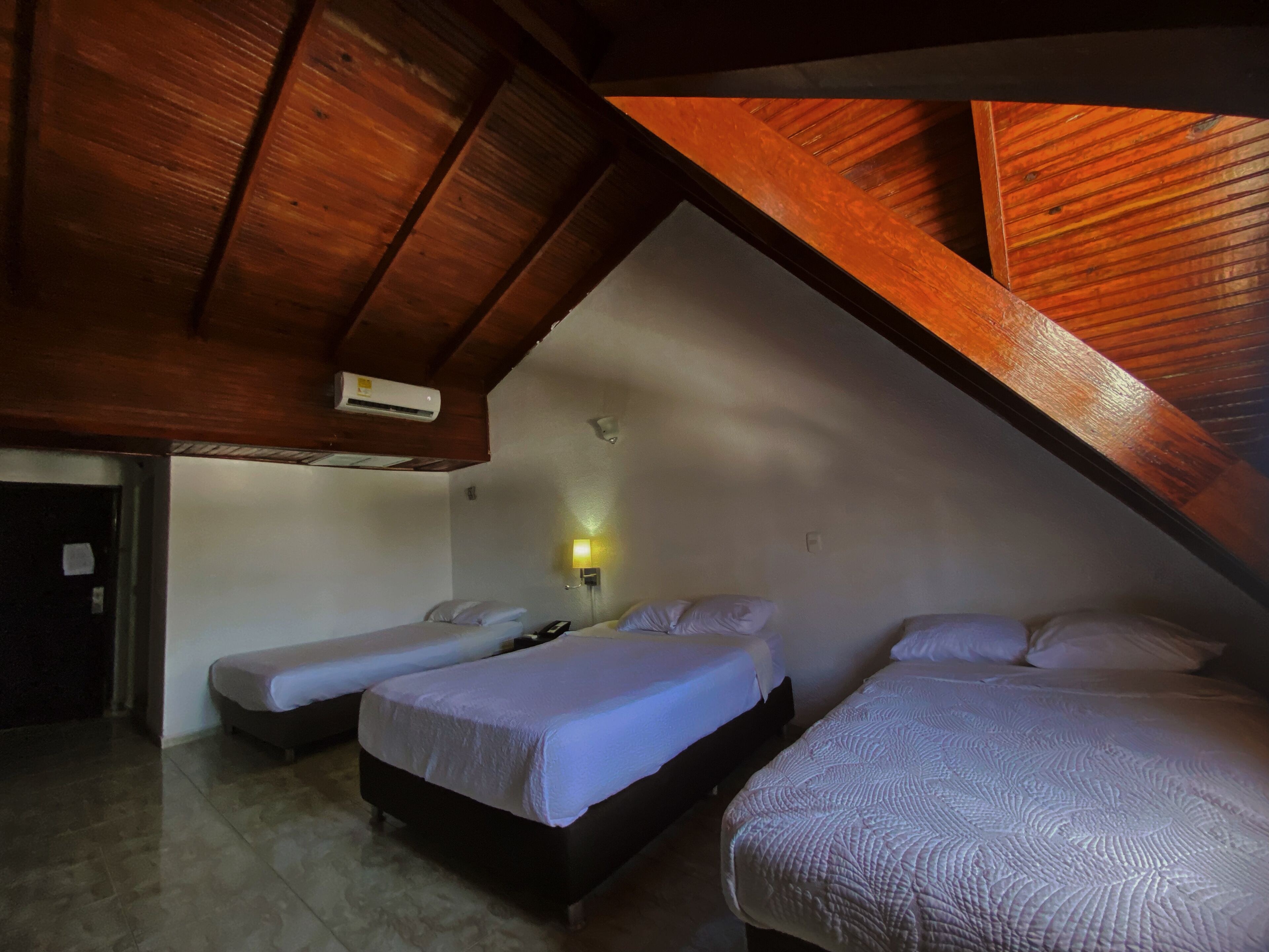 Standard Quadruple Room, Multiple Beds, Housekeeping, Partial Sea View