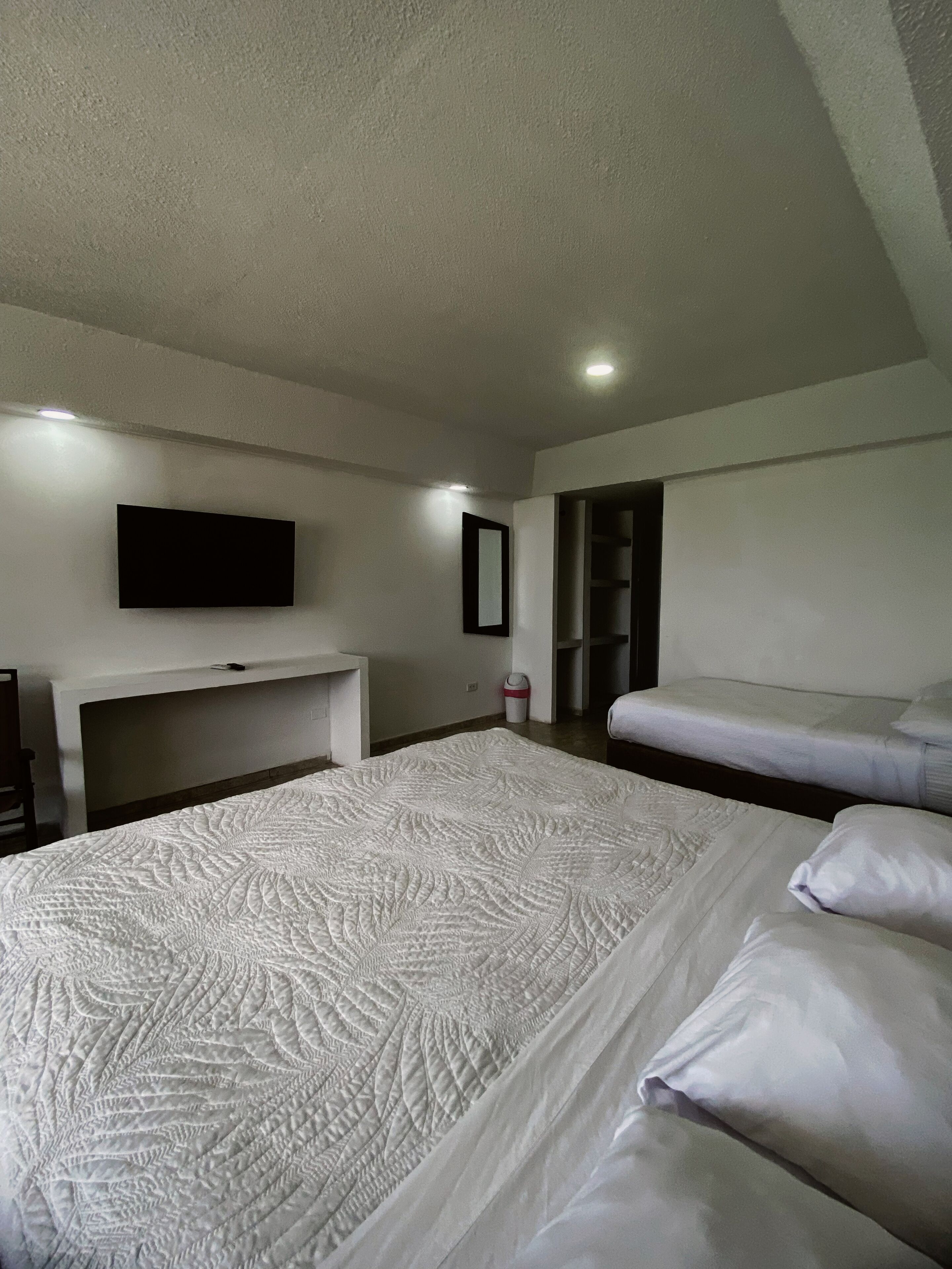 Standard Triple Room, Multiple Beds, Housekeeping, Partial Ocean View