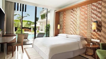 Chambre Deluxe, 1 très grand lit, accès piscine | Coffres-forts dans les chambres, fer et planche à repasser